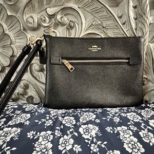 Coach women’s large wristlet